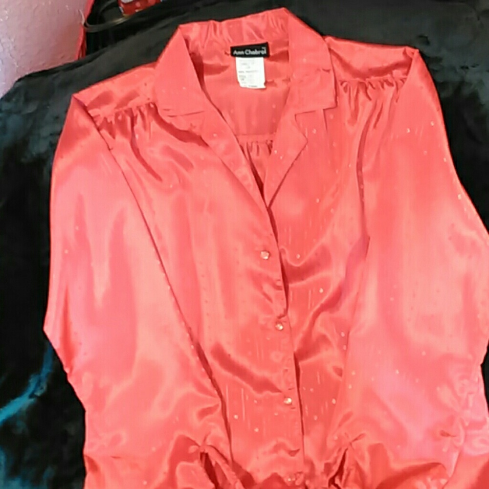 A red blouse by Ann Chabrol